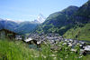On the edge of the forest, there is a clear view of the village and the Matterhorn - a wonderful view.